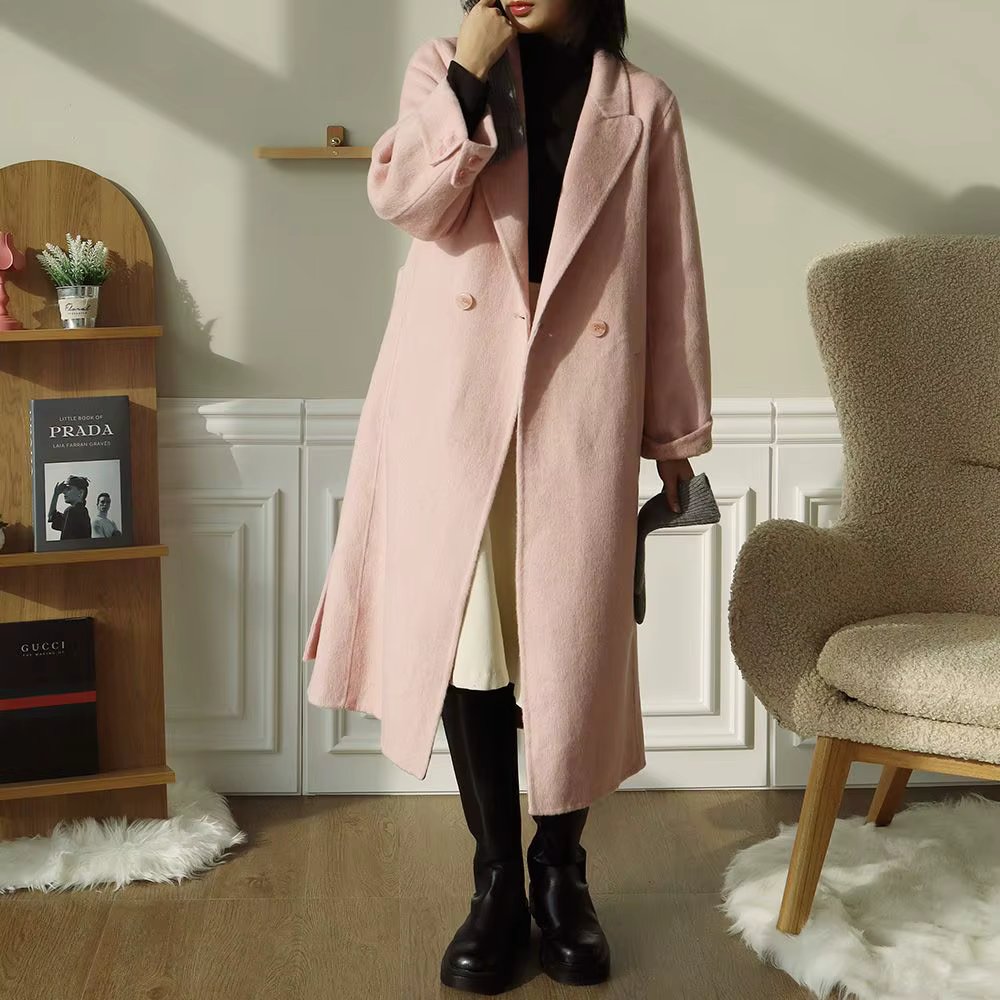 Women's handmade retail roll up long coat Year-End Guest look