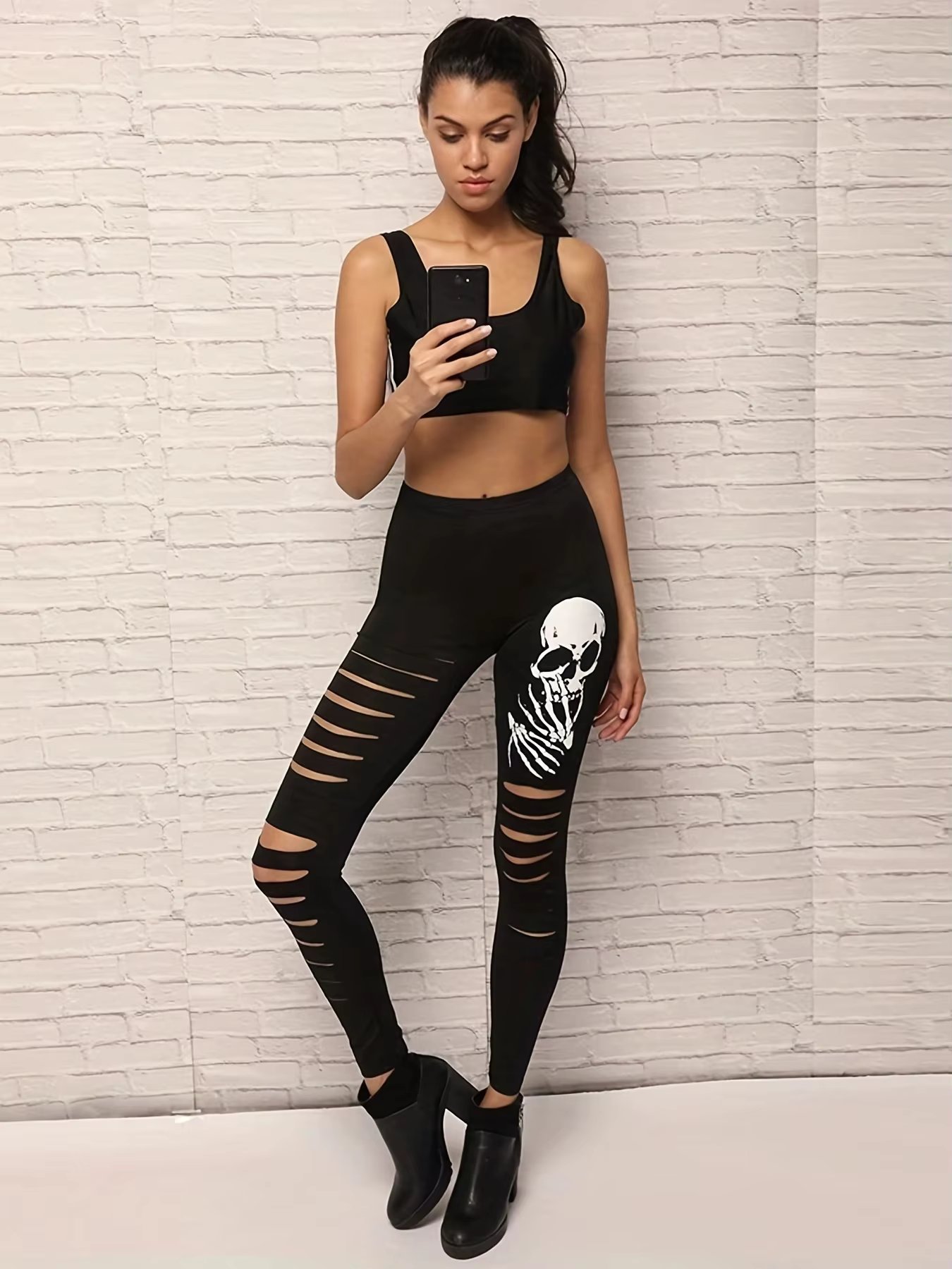 Spring And Summer Hot Selling Ladies Fashion Ripped Leggings Women's Black Tight Nine-point Pants Skull Casual Small Foot Pants