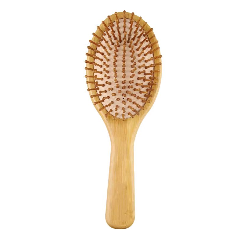 Oval massage comb
