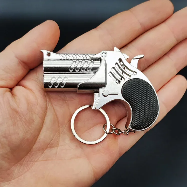 1Pcs Mini Keychain Metal Rubber Band Gun Game Toy Gun Launcher Children's Simulation Pistol Toys Gifts Pendent