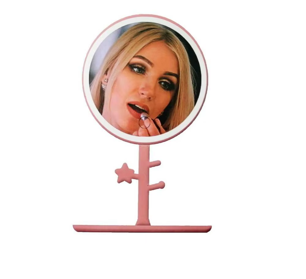 Mirror with LED light for makeup. Plastic stand equipped and rechargeable. Perfect definition and sharpness. Model elegant